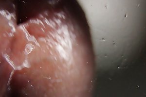 Makró közelről cumming az üvegen